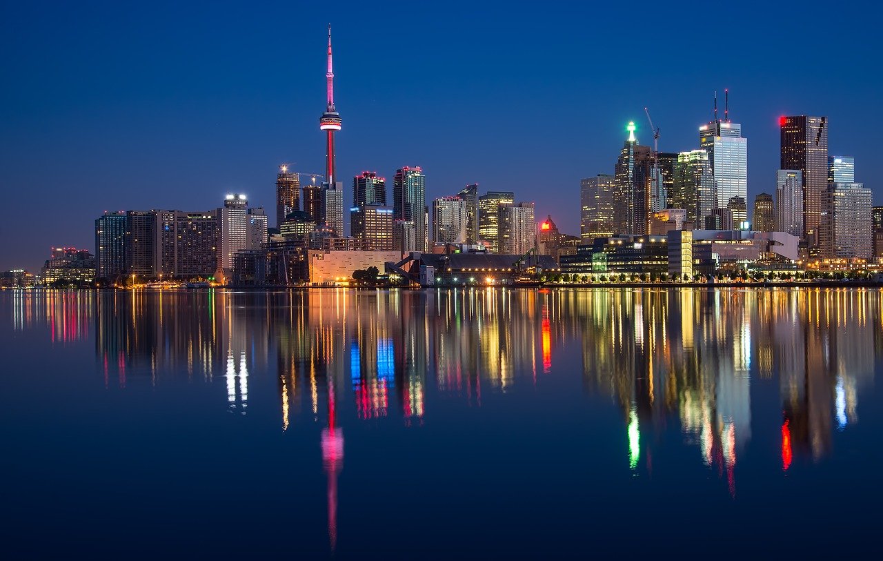 buildings, cn tower, river